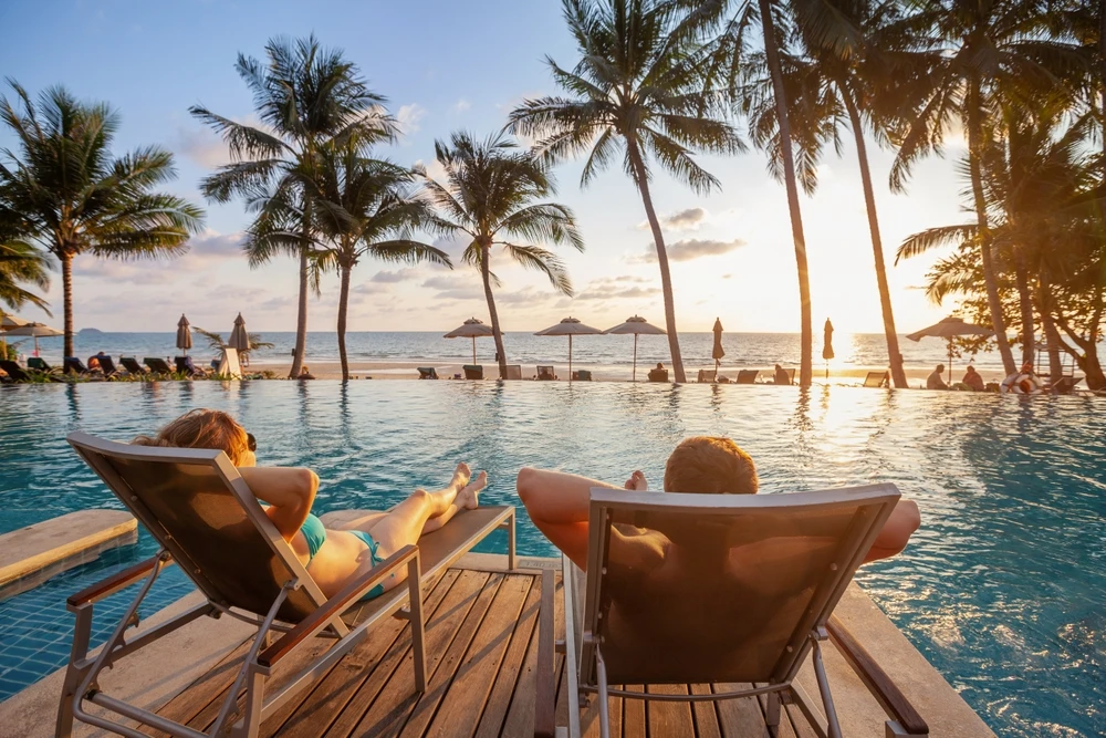 Couple sitting at their dream vacation